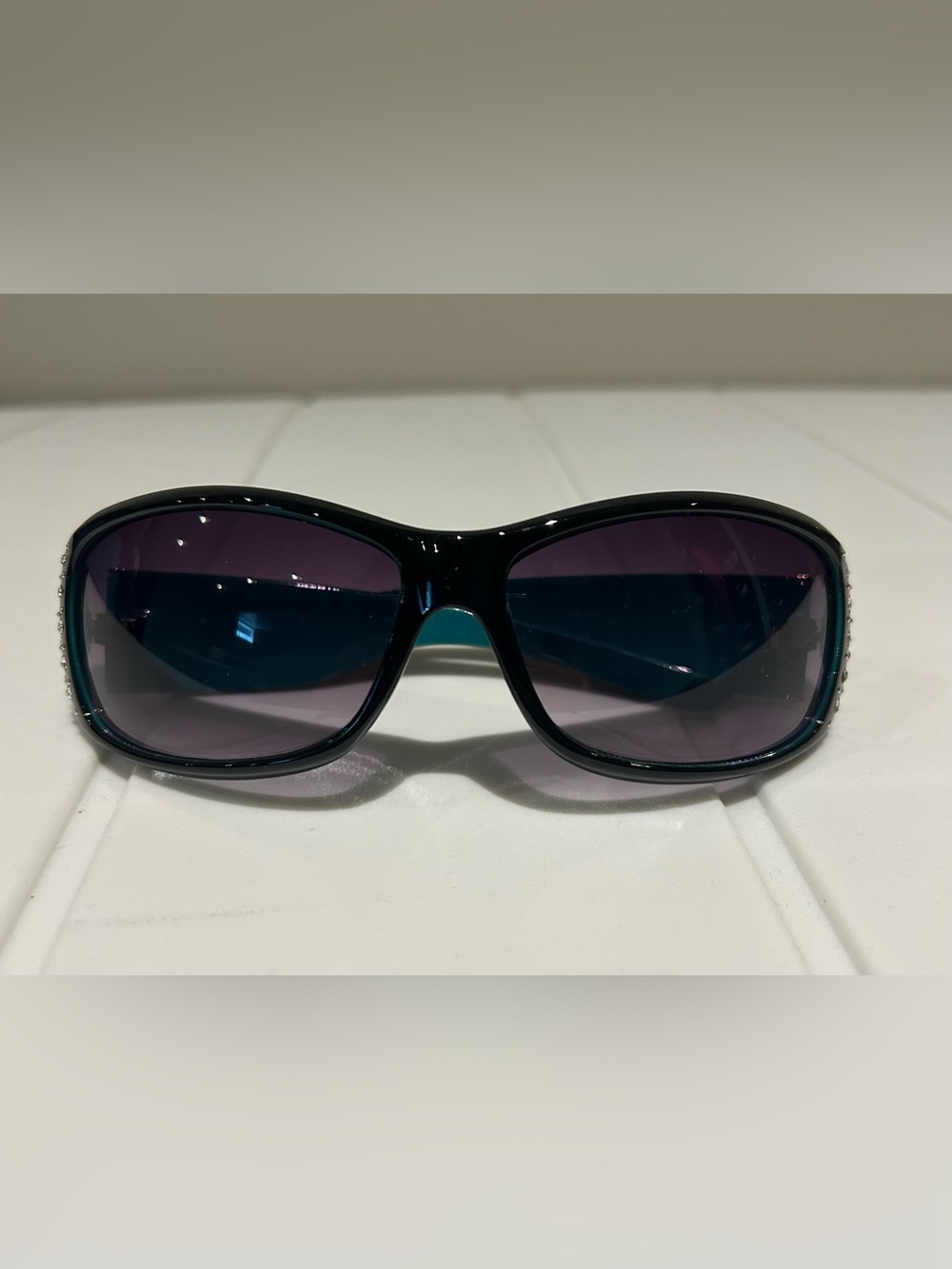 Women's Black and Teal Floral Accent Sunglasses with Purple Gradient Lenses